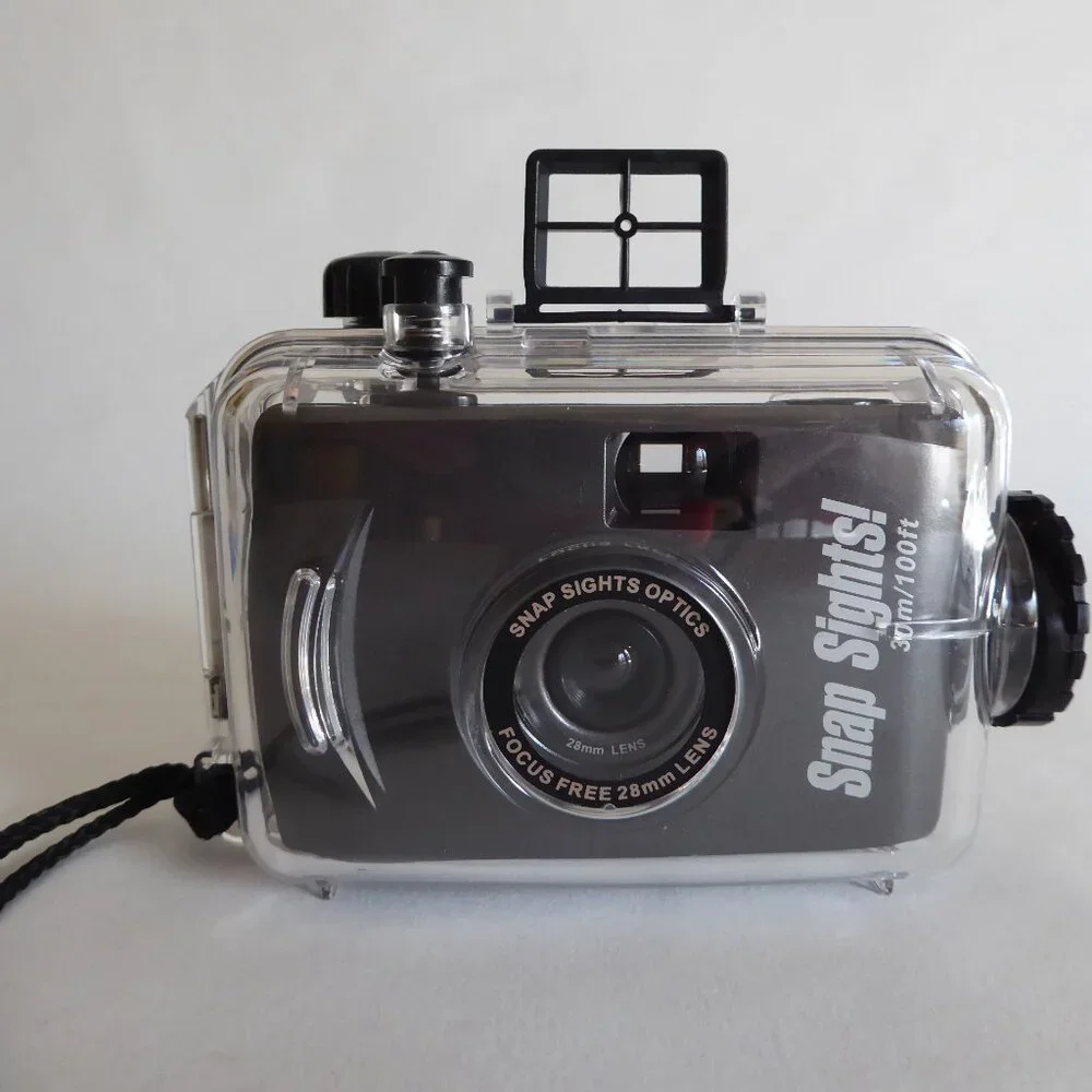 USED ONCE WATERPROOF SPORT UTILITY COMPACT 35mm CAMERA IN CASING